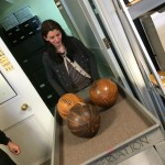 Basketballs leaving vault